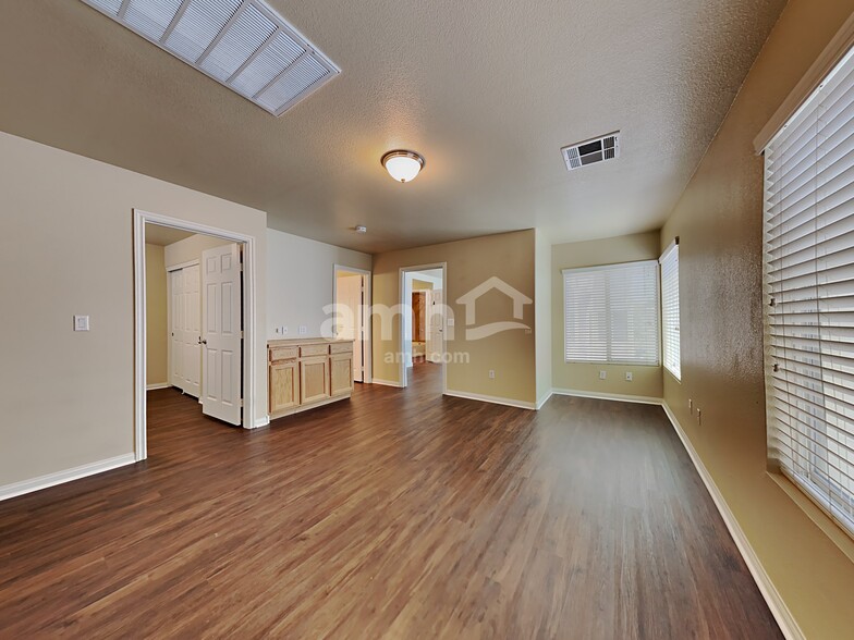 Building Photo - 8164 Golden Flowers St