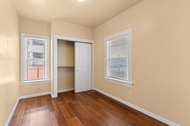 Building Photo - Utilities Included! Bright 1BD w/ Granite Kitchen & Plank Flooring