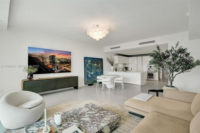 Building Photo - 10201 Collins Ave