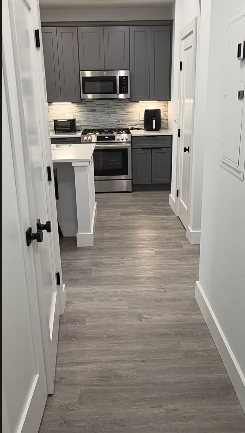 view of kitchen from bathroom - 27 Booth St