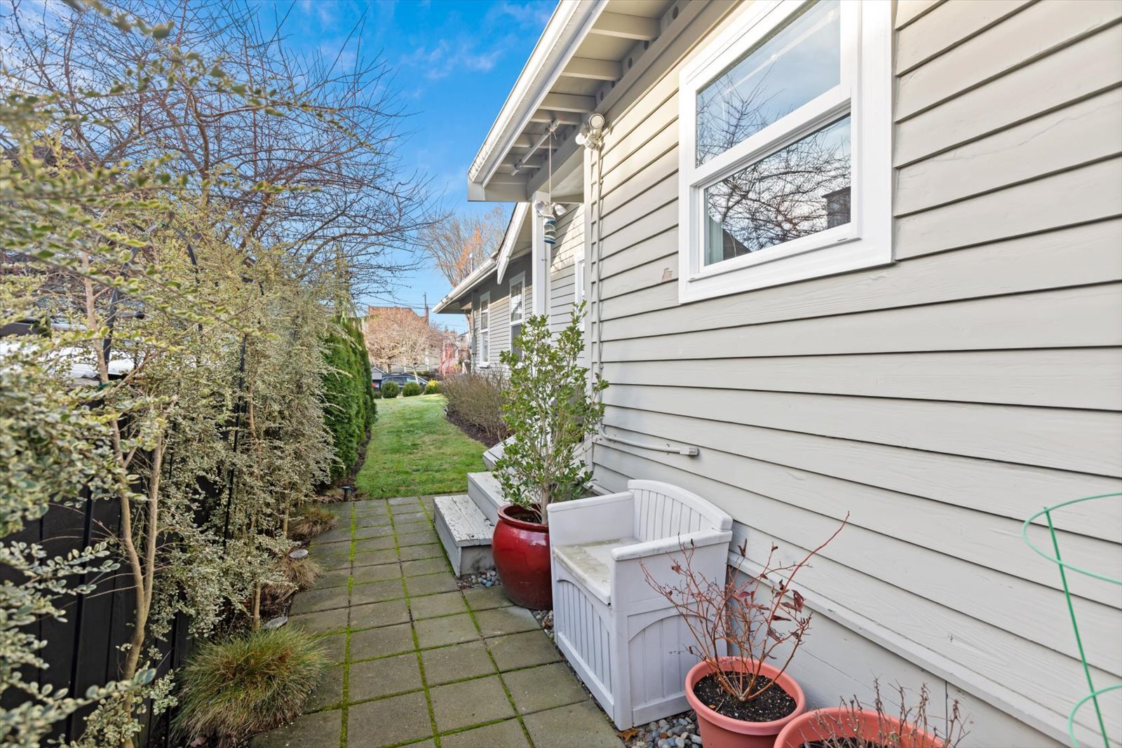 Side yard with landscaping - 8042 Earl Ave NW
