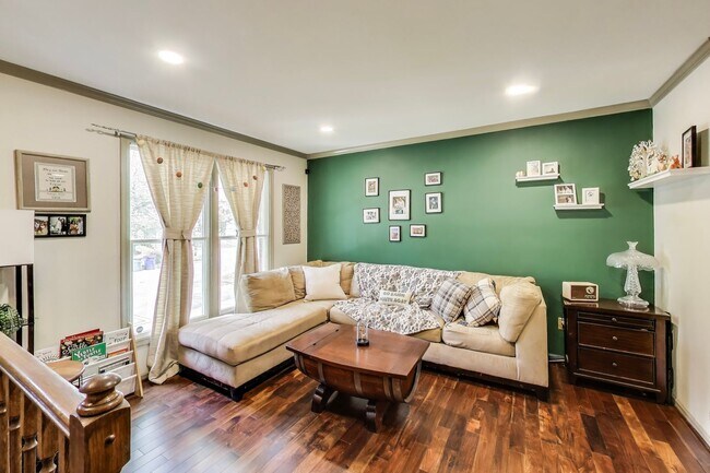 Building Photo - COMINGS SOON - Beautifully Updated Winchester-Built Townhome Backing to Serene Parkland.