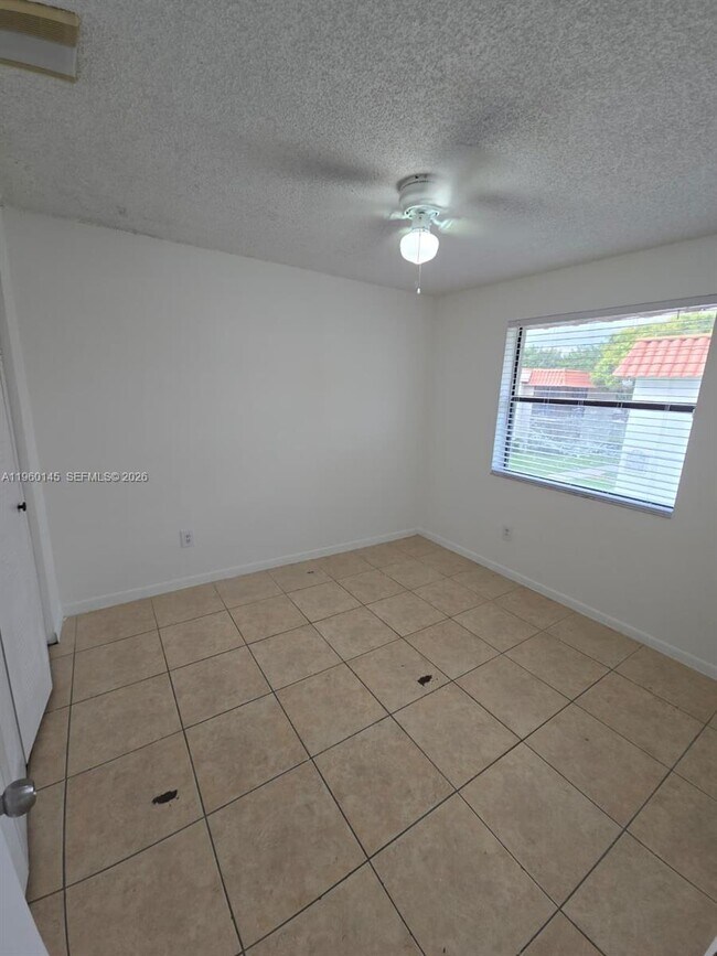 Building Photo - 9718 Hammocks Blvd