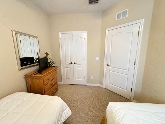 Building Photo - Fully Furnished 5-Bed End-Unit Townhome with Hot Tub in Gated Coral Cay! WASHER & DRYER INCLUDED!