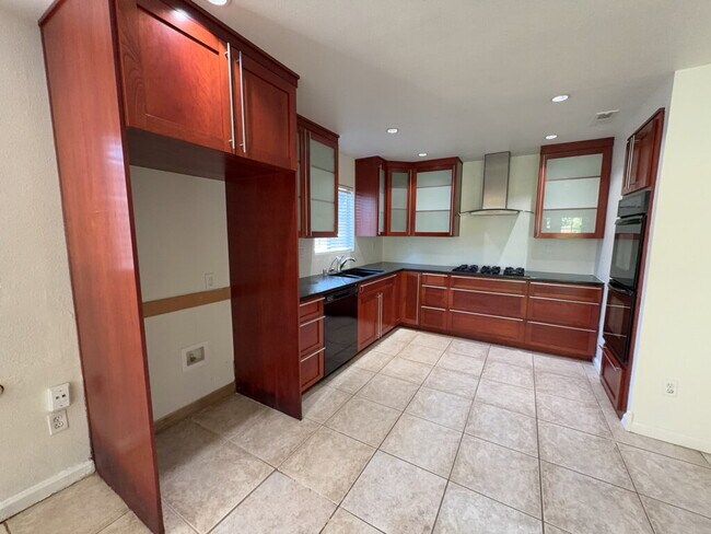 Building Photo - "Charming Riverside Retreat: Spacious 4-Be...