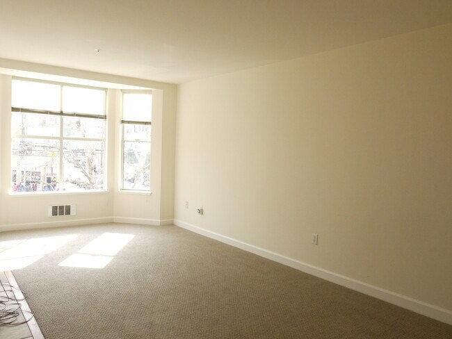 Building Photo - Spacious two bedroom, two bath corner unit condominium in North Beach