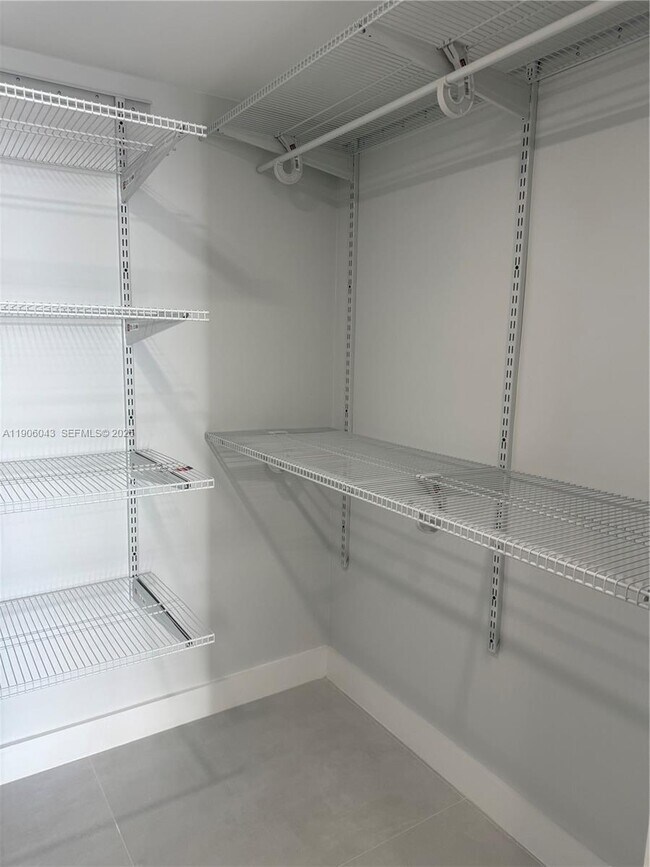 Building Photo - 3675 N Country Club Dr