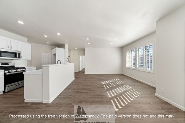 Building Photo - Welcome to this stunning 2-bedroom condo in gated community