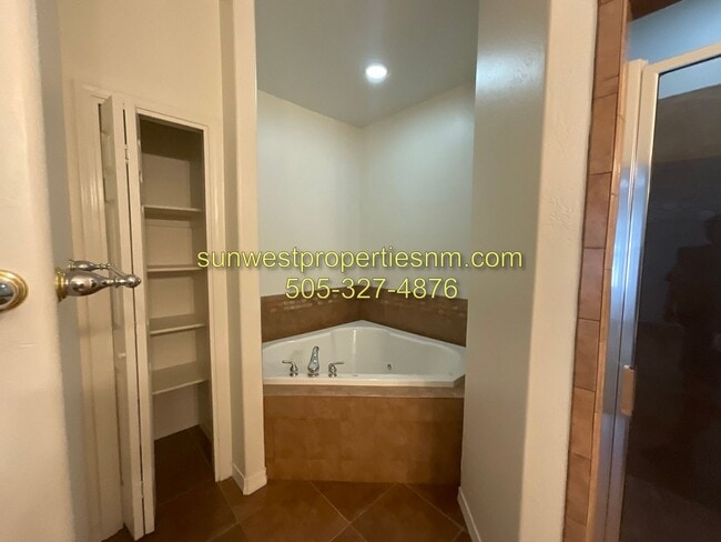 Building Photo - 3 Bedroom, 2 Bathroom Condo with 2 Car Gar...