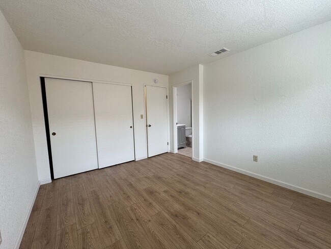 Building Photo - Four Bedroom, Two Bathroom, Water/Sewer/Trash and Yard Maintenance Included!