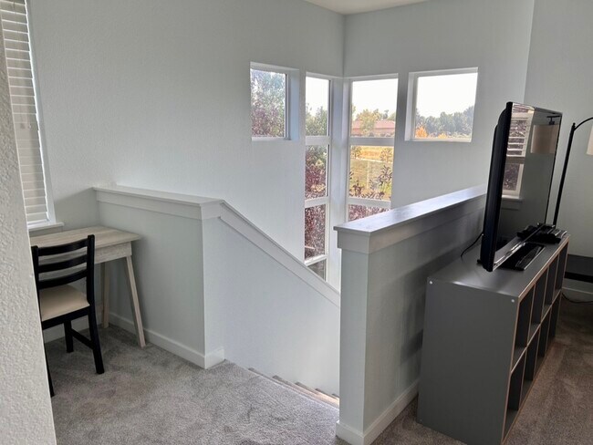 Stairs up from 1st floor - 9921 E 26th Ave