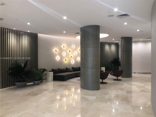 Building Photo - 10275 Collins Ave