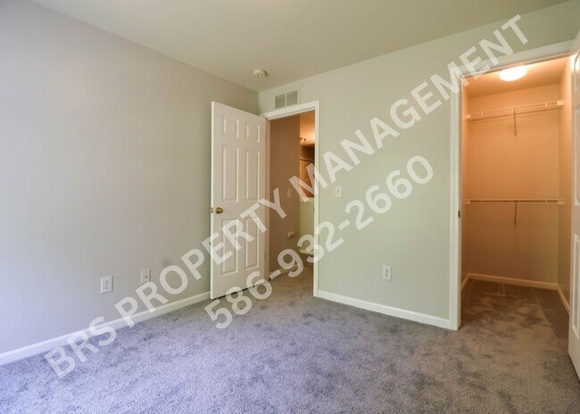 Building Photo - Move-In Ready 2BR Condo with Covered Garage in Harrison Township