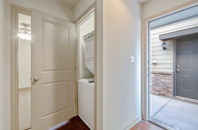 vertical stacked washer dryer next to the entry on ground floor - Tinsley Place