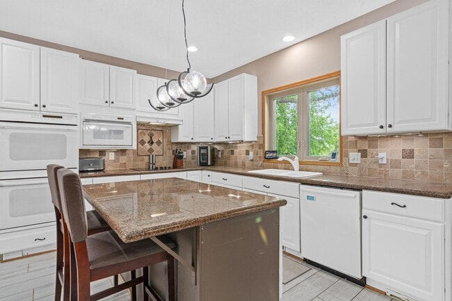 Building Photo - Luxury 4-Bed Retreat with In-Ground Pool & 3-Car Garage