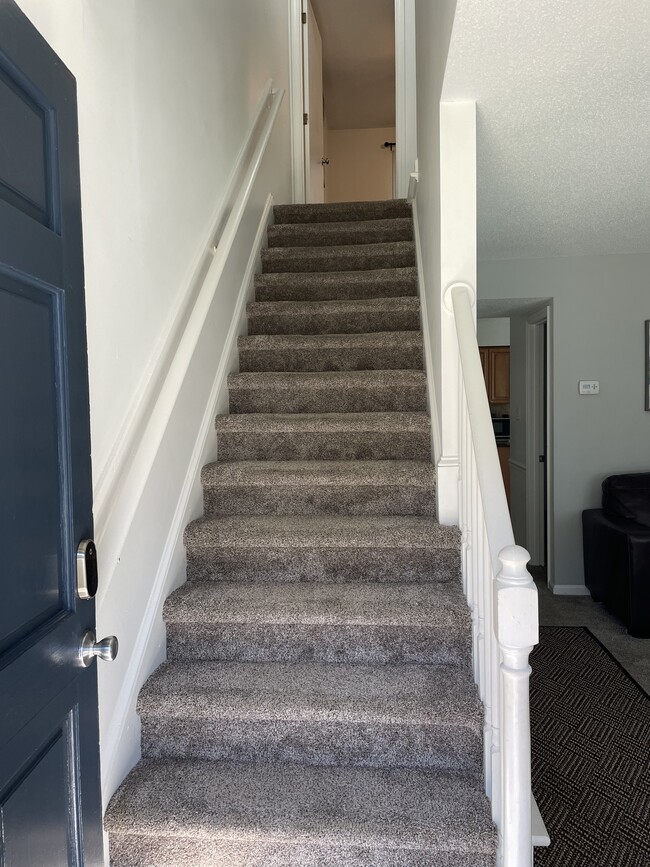 Steps to upstairs bedrooms - 701 Branniff Dr