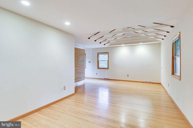 Building Photo - This elegant and unique three-level split ...