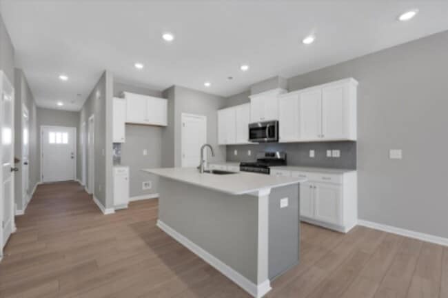 Building Photo - Stylish Living with Convenience at Your Doorstep