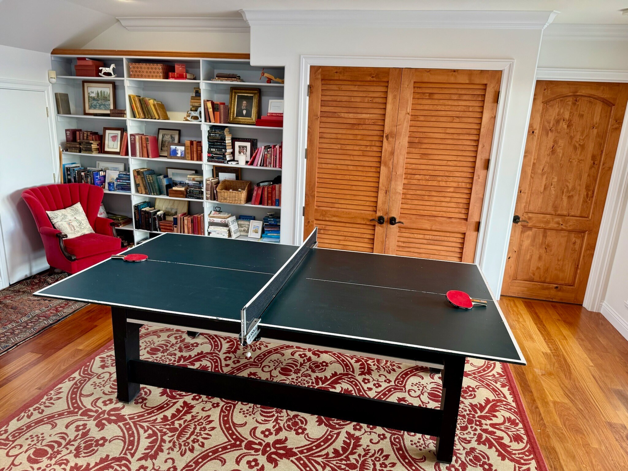Downstairs game room: Game room with a ping pong table, pool table, air hockey, regulation darts - 115 Inez Pl