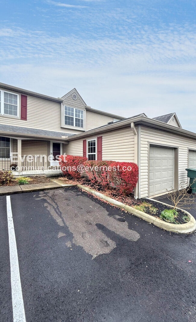 Building Photo - Spacious Condo with Modern Amenities and Garage Parking