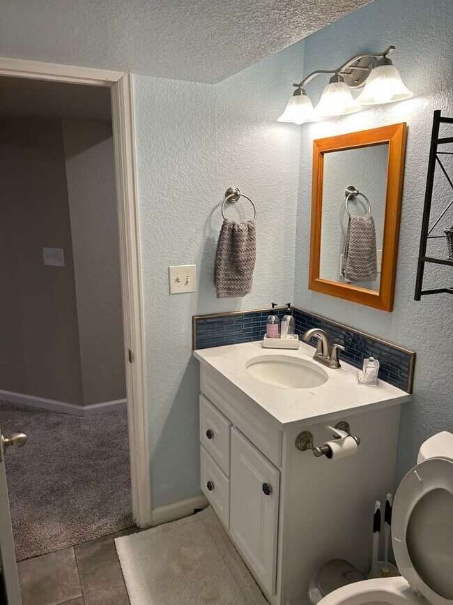 Building Photo - Rare 4BR End-Unit in Northpark with Finished Basement and 2-Car Garage