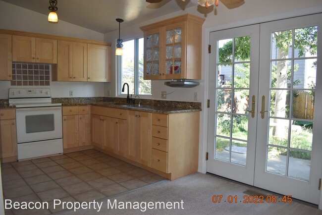 Building Photo - 3 br, 1 bath House - 8867 W. Toller Ave