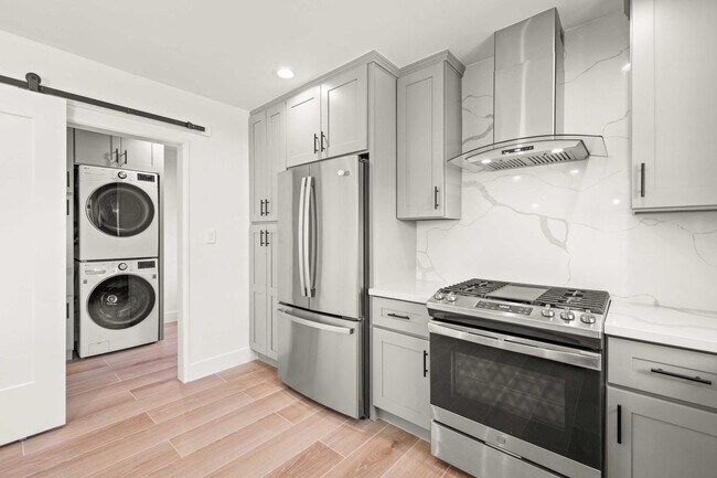 Building Photo - Stylishly Remodeled 4-Bedroom Home in Prim...