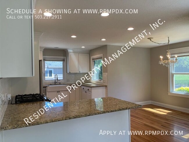 Building Photo - 7065 N Woolsey Ave