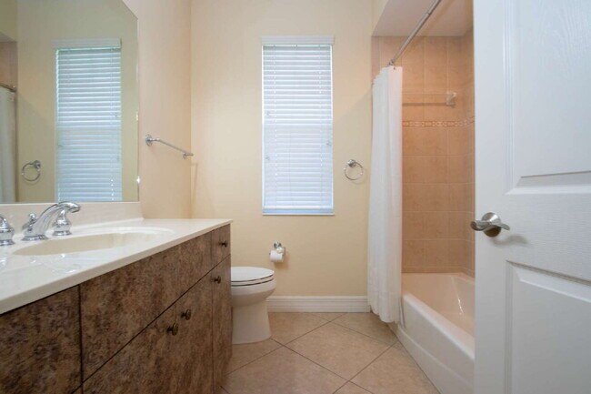 Building Photo - Rarely available executive home in The Hammocks is ready to rent on a long-term lease.