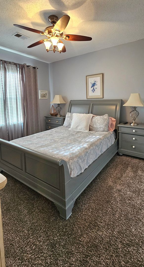 Building Photo - Stunning First-Floor, Fully Furnished Condo with Pond Views