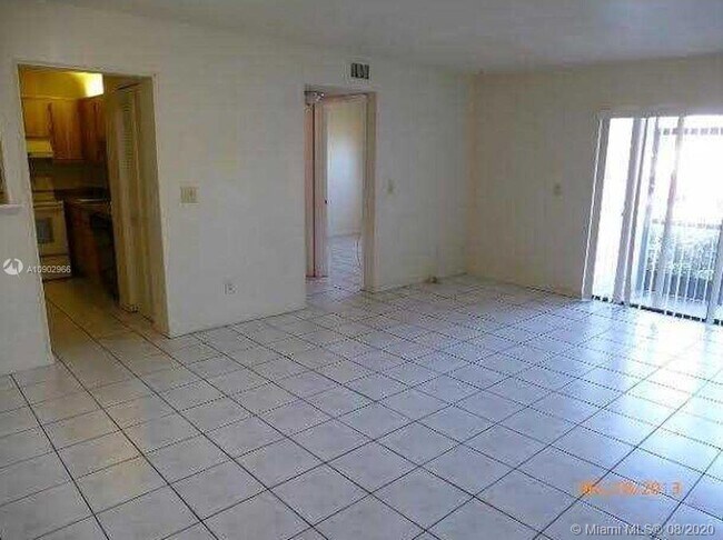 Building Photo - 10724 Royal Palm Blvd