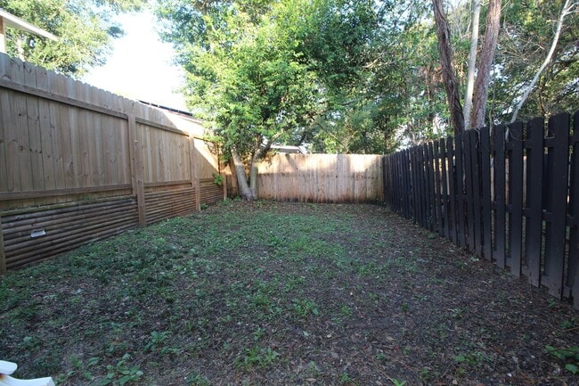 Building Photo - West Pensacola 2BR Townhome with Fenced Backyard, Upstairs Balcony, Modern Kitchen- Near Shopping...