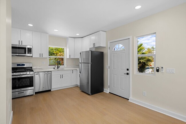 Building Photo - Brand New 1BR/1BA Home Near SDSU – Designer Kitchen, In-Unit Laundry, Private Patio, and Modern F...
