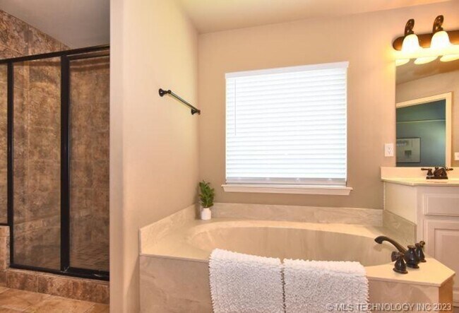 Building Photo - Room for the whole family in this 5 bedroom, 3-1/2 bath Executive Rental on corner lot in Millice...