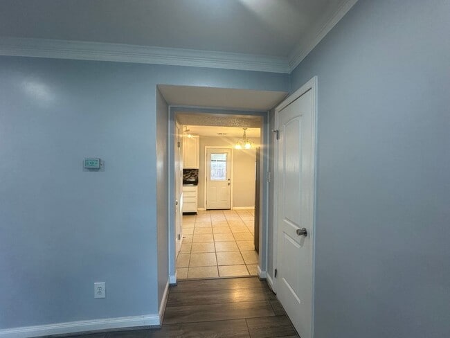 Building Photo - Centrally Located 2 BR Green Townhome with Fenced Patio
