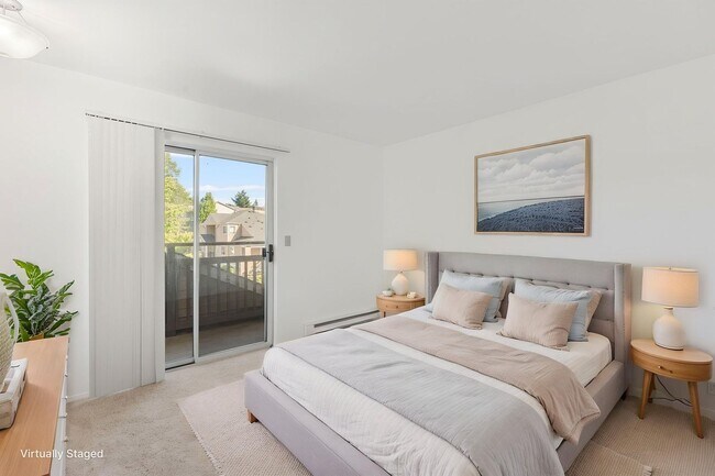 Building Photo - 2 level condo, 3 decks, Stainless Appliances, 2 parking spots, Water, sewer, garbage included!