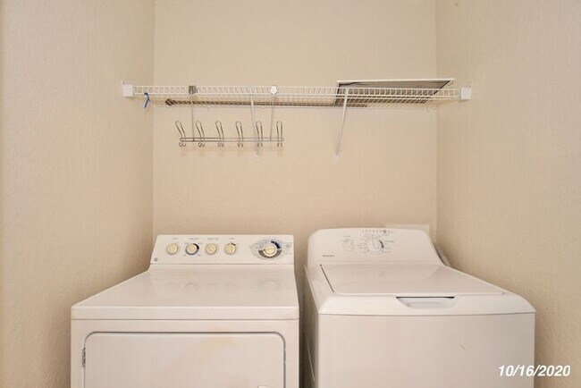 Building Photo - Beautiful 3/3.5 Townhome with a Spacious 2 Car Garage in the Gate Guarded Community of Spring Isl...