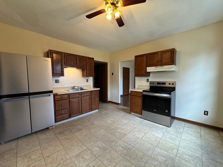 Kitchen w/ new appliances - 67 E Main St