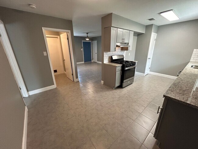 Building Photo - *COMING SOON* Open-Concept 3BD/2BA with Cozy Fireplace & Modern Stainless Kitchen!