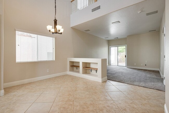 Building Photo - Spacious 3-Bedroom Home Featuring Downstai...