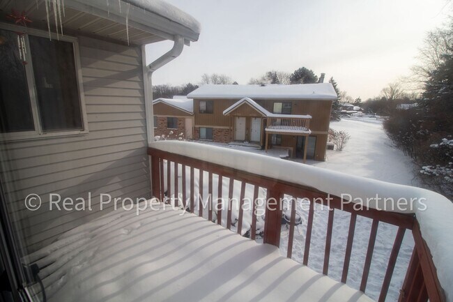 Building Photo - 2-Bed, 1-Bath Upper Unit with Garage & Porch – Steps from Paul Henry Trail