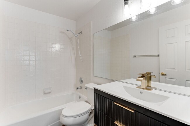 Building Photo - Stylish Remodeled 2-Bedroom Condo with Bal...