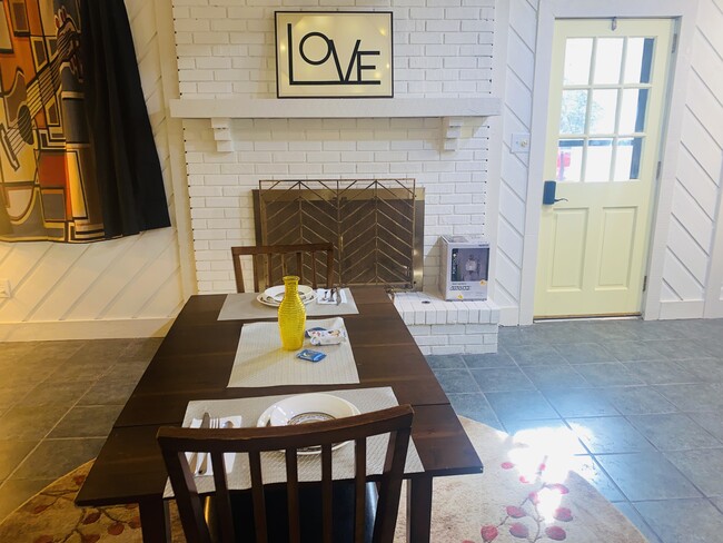 View of entry door and fireplace - 1925 Charlotte Dr