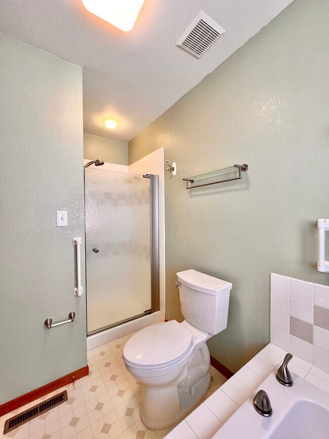 Building Photo - Spacious 3 bedroom/3 bath Townhome with 2 car Attached Garage and Private Yard in Evans, CO