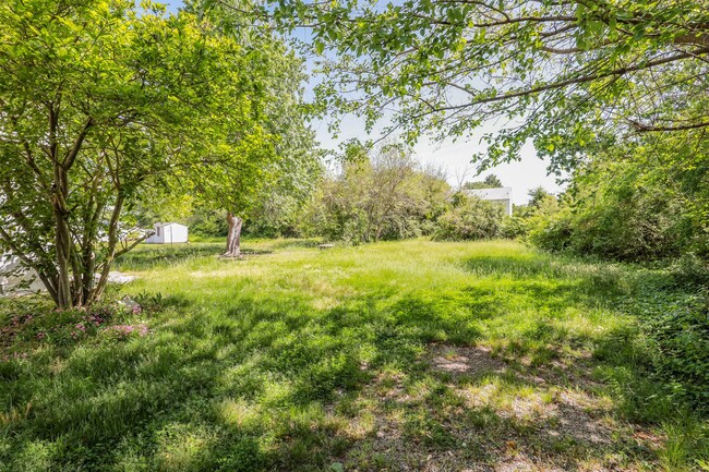 Building Photo - Charming 4-Bedroom Home with Hardwood Floo...