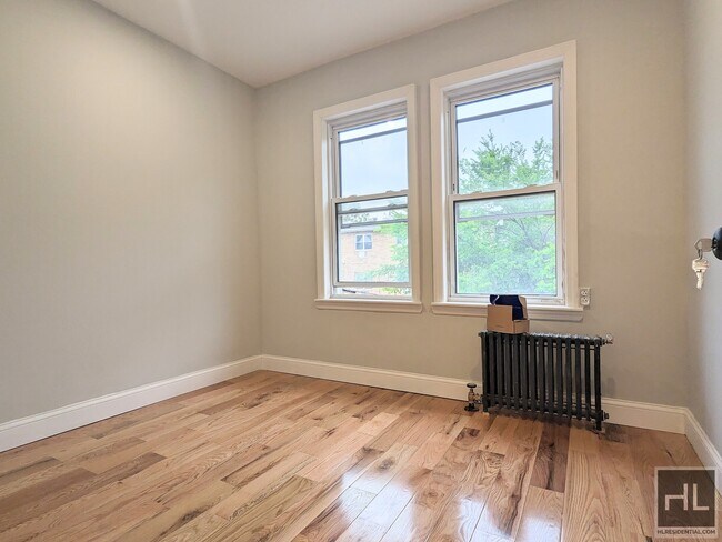 Building Photo - Beautiful Renovated Jackson Heights apartment
