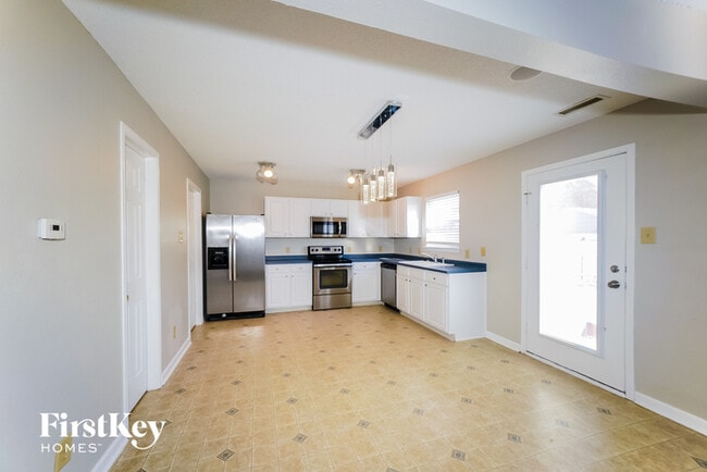 Building Photo - 6405 Monteo Dr