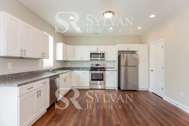 Building Photo - Come and live the good life in this 4-bedroom, 2.5-bathroom home