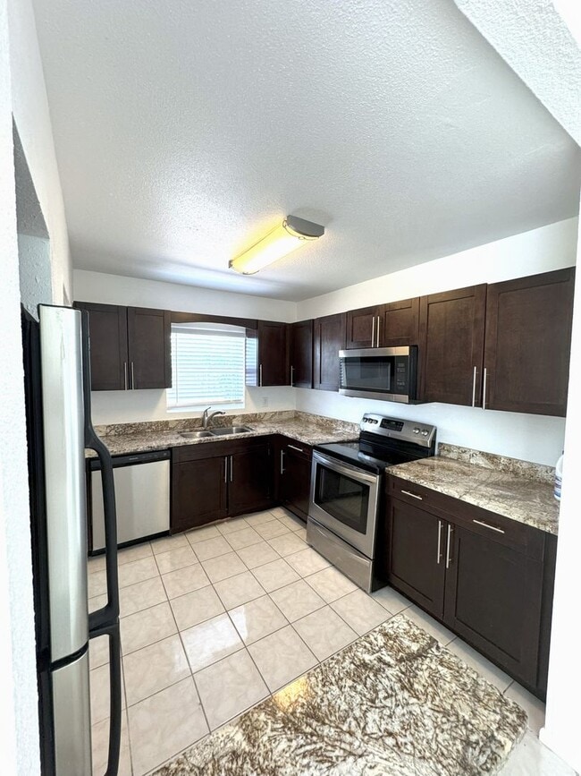Building Photo - For Rent Beautiful 4-Bedroom Home with Bon...