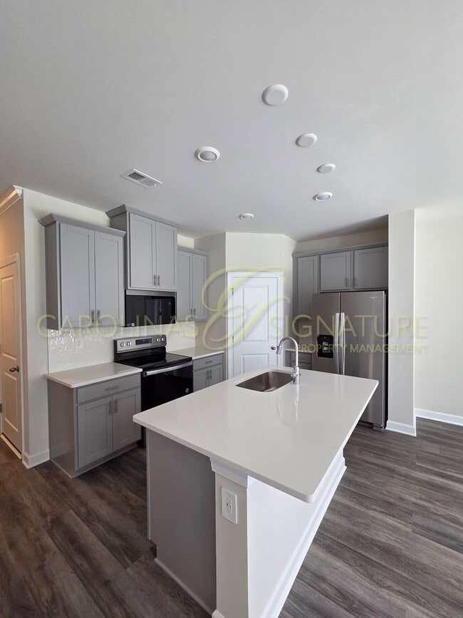 Building Photo - AVAILABLE SEPTEMBER 1! NEW CONSTRUCTION; 3...